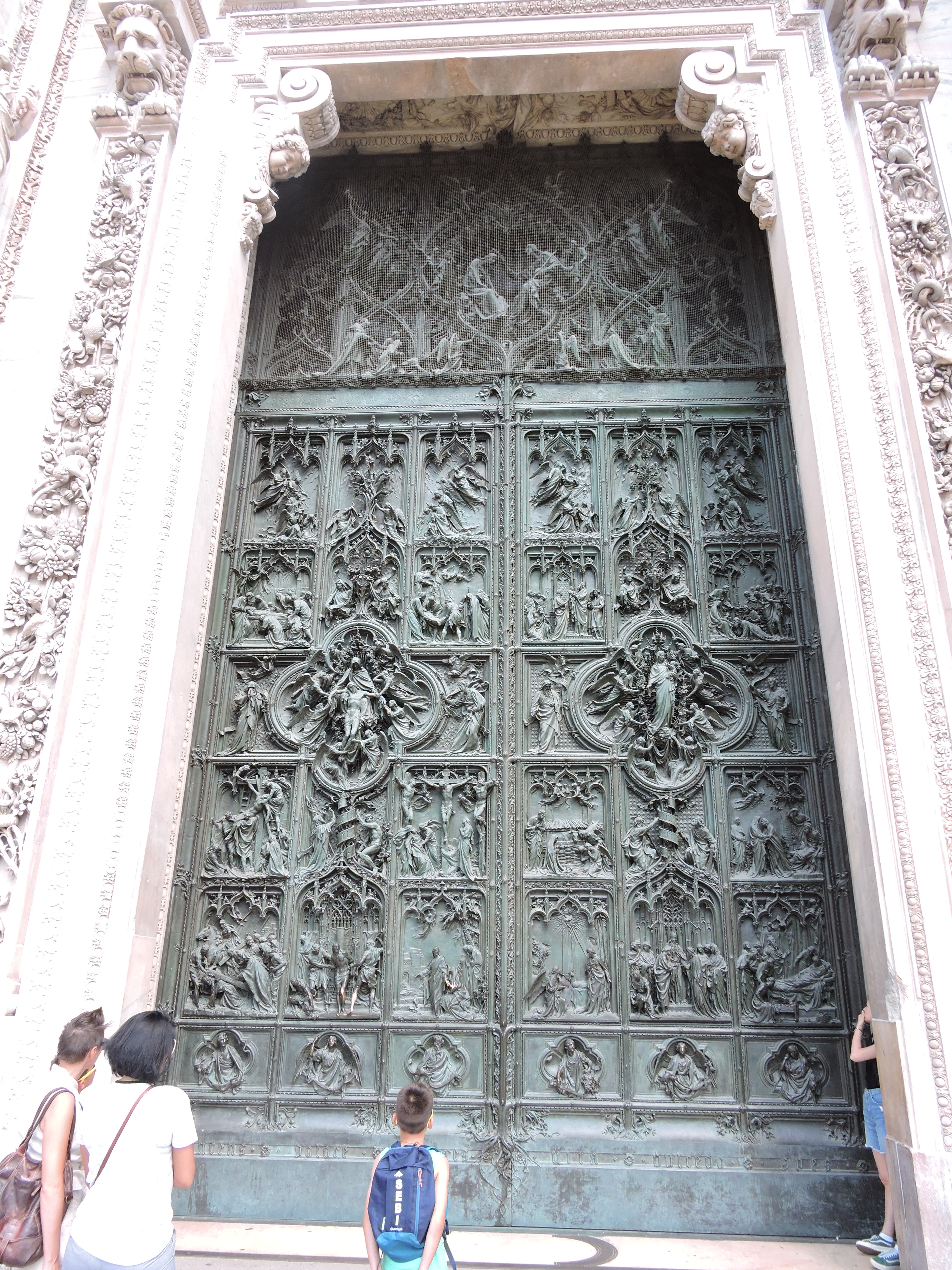 Art_work_on_door_Milan_Cathedral__Italy.jpg